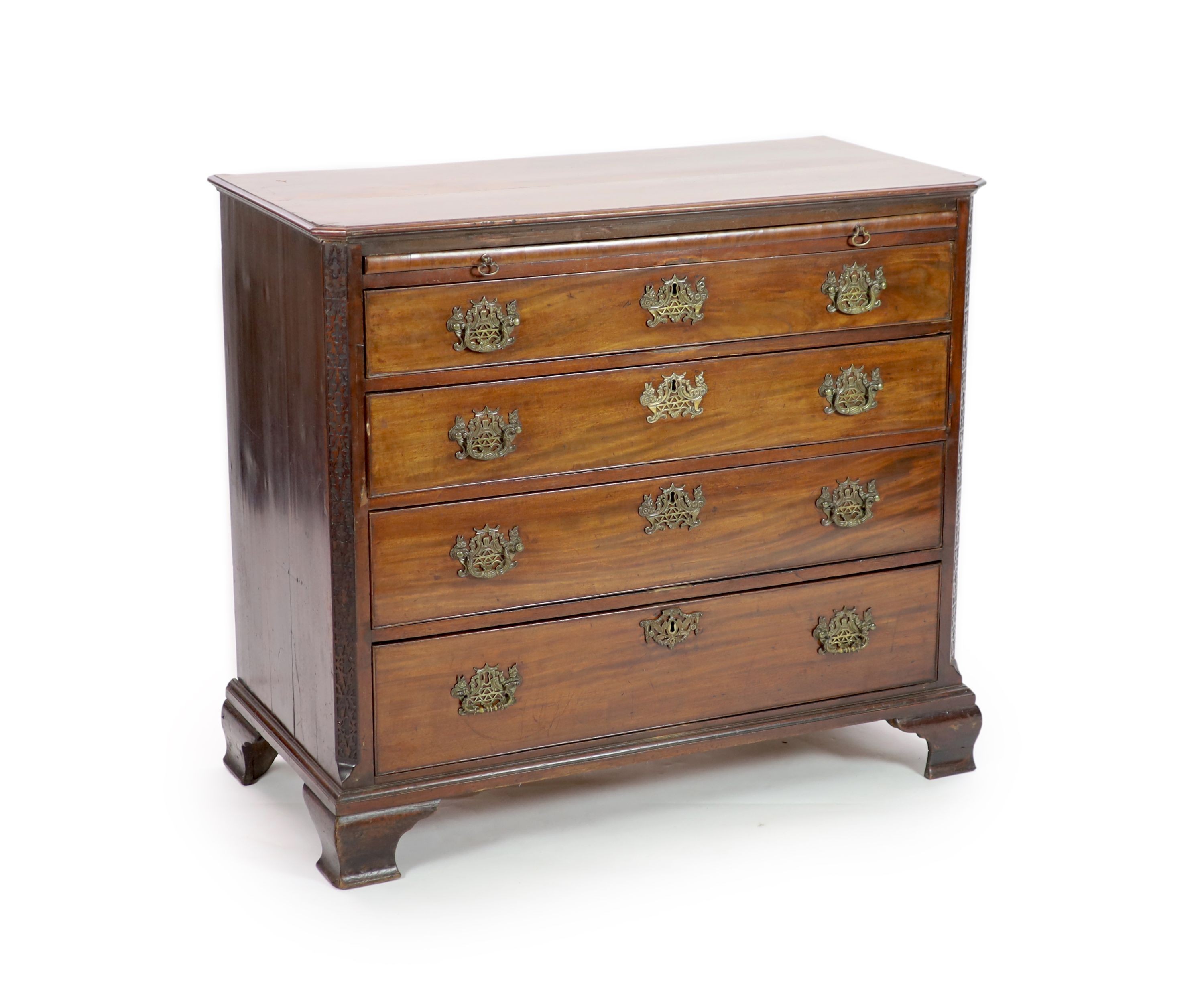 A George III mahogany four drawer chest of drawers with brushing slide, width 110cm, depth 54cm, height 98cm